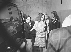 Patty Hearst escorted by marshals.jpg