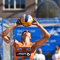 Image 2A player hand sets the ball (from Beach volleyball)