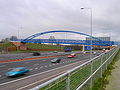 M60 New Dunmow Walk - an arch cable supported bridge. Near Manchester on the M60 ringroad