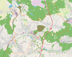 Mapa konturowa Czerwionki-Leszczyn, po prawej nieco na dole znajduje się czarny trójkącik z opisem „Ramża”