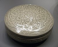 Box decorated with carved peony flowers