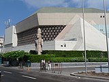 An ancient statue in front of the Conference Center