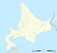 Mapa konturowa Hokkaido, blisko dolnej krawiędzi po lewej znajduje się punkt z opisem „Powiat Hiyama”