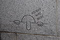 Engraving of the graffito "Kilroy" on the WWII Memorial in Washington, D.C.. Kilroy was a popular graffito among American G.I.s during the Second World War.