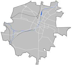 Mapa konturowa Kielc, blisko centrum na prawo u góry znajduje się punkt z opisem „IV Liceum Ogólnokształcące w Kielcach”