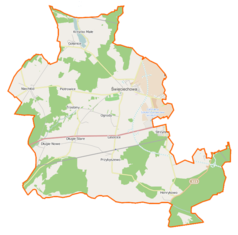 Mapa konturowa gminy Święciechowa, blisko centrum na prawo znajduje się punkt z opisem „Lotnisko Leszno-Strzyżewice”