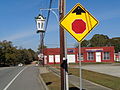 Christmas decoration and stop ahead sign on GA135