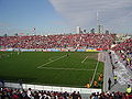 Packed stadium facing west to the CN Tower and downtown Toronto