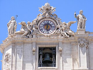 Clock on the top of facade (left)
