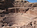 Image 1 The "Theatre" at Petra Photo: Douglas Perkins Petra is an archaeological site in Jordan, lying in a basin among the mountains which form the eastern flank of Wadi Araba, the great valley running from the Dead Sea to the Gulf of Aqaba. It is famous for having many stone structures carved into the rock. More featured pictures