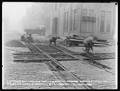 Monthly Progress Photo, Railroad Track Repairs at Dock and Second Streets, Looking Southwest, Yard Labor - DPLA - 42aa1f2887daac26ce8332c9189255f3.jpg