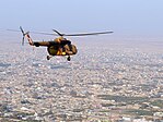 Afghan Air Force helicopter flies over Mazar-i-Sharif