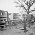 Ambulance crews of the First Aid Nursing Yeomanry (FANYs) stowing stretchers aboard their Austin K2/Y ambulances, Colchester, 3 May 1941.