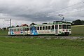 Be 4/8 34 en 2010 près de la gare de Sugnens.