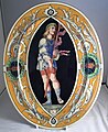 Minton tin-glazed Majolica oval plate, painting by Kirkby,[14] after Triumphs of Caesar (Mantegna). Almost identical example in V&A.