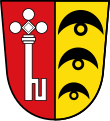 Gemeinde Grünenbaindt Gespalten von Rot und Gold; vorne ein gestürzter silberner Schlüssel, hinten übereinander drei schwarze Wolfsangeln.[13]