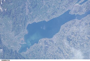 Mündung des regulierten Rheins in den Bodensee, Sedimentwolke (a view from ISS)