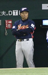 Sadaharu Oh standing wearing a Japan national baseball team uniform during the 2006 World Baseball Classic