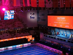 Budapest2017 FINA world championships 100breaststroke Victory Ceremony Efimova (Russia) Meili (USA) King (USA) (2).jpg