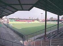 Vue de l'intérieur d'un stade depuis un quart-de-virage