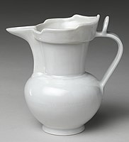 "Monk's cap ewer" with "secret" inscription (an hua) in Sanscrit; this shape was for use on altars, normally in white, and often presented to Buddhist shrines by the emperor