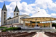 Covered outdoor shrine with seating