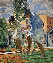 Two men digging in soil with pitchforks on a cloudy day