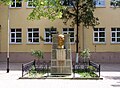 Bust of Mustafa Kemal Atatürk in front of one of the elementary schools