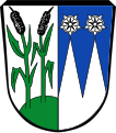 Gemeinde Horgau Gespalten; vorne in Silber auf grünem Boden zwei grüne Schilfrohrstängel mit schwarzen Kolben, hinten in Blau zwei silberne, mit silbernen Rosen besteckte Spitzen.