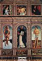 Políptico renacentista en el que una compleja enmarcación distribuye un programa pictórico religioso (San Vicente Ferrer, de Giovanni Bellini).