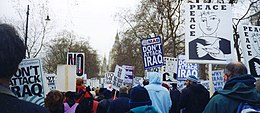 Demonstrators, with many signs