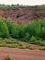 Iron mine at Tzines, with Paleolithic mine-tunnel