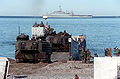 An AAV from the USS Nassau advances onto Green Beach during a mock invasion in Stephenville, Newfoundland (Unified Spirit 98).