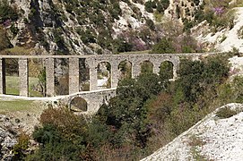 Bridge and aqueduct in Bënçë, Southern Albania. Photograph: Albinfo