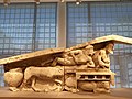 Pediment with Dionysos at the Corfu Museum. Left part of an Archaic pediment from the area of Figareto. It depicts a Dionysiac symposium. Dated to 500 BC.