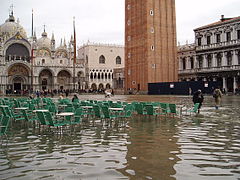 Tidal flooding. Sea-level rise increases flooding in low-lying coastal regions. Shown: Venice, Italy (2004).[281]