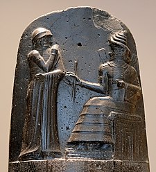 Babylonský král Chammurapi před bohem Šamašem.