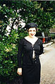 Image 128Woman dressed in black maxi skirt, top and hat, 1995. (from 1990s in fashion)