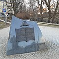 Napoleon's Stone in Olsztyn, next to Łyna (Alle) river, with a bilingual Polish and French inscription