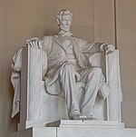 Marble statue of a seated man