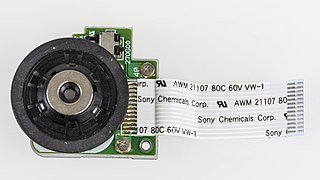 Plextor PX-716A - disc drive motor with Sony Chemicals flexible flat cable-6417.jpg