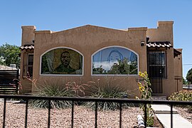 Images of George Floyd and Breonna Taylor are displayed in the front windows of a home in the Silver Hill neighborhood of Albuquerque, New Mexico during July, 2020.jpg