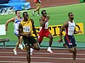 Tyson Gay mentre stabilisce il record dei campionati sui 100 m ad Osaka 2007