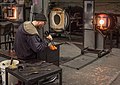 Image 87Glass blower. This was moments before he accidentally dropped it. Heartbreaking (and vasebreaking). Talented folks here, though, and I actually went back a while later and took a class. Got a piece of lit up frozen spaghetti to prove it.