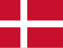 Red with a white cross that extends to the edges of the flag; the vertical part of the cross is shifted to the hoist side