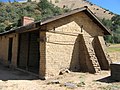 Officers' quarters. This building has been stabilized but not restored, and is not open to the public. The interiors may be viewed through the wire fencing.