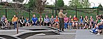 A Marine talking with visitors about the memorial