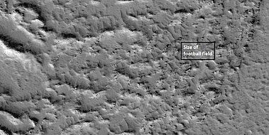 Close view of a lava lobe, as seen by HiRISE under HiWish program. The box shows the size of a football field.