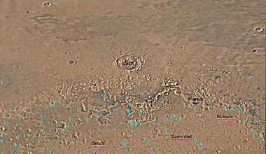 Map of Ismenius Lacus quadrangle which is located just north of Arabia, a large bright area of Mars. It contains large amounts of ice in glaciers that surround hills.