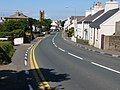 The main A3 road leading through Kirk Michael village after Douglas Road Corner